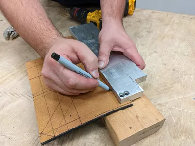 Marking the tread for cutting using a band saw